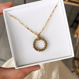 COLLIER SOLAIRE ETINCELLE HEMATITES DOREES